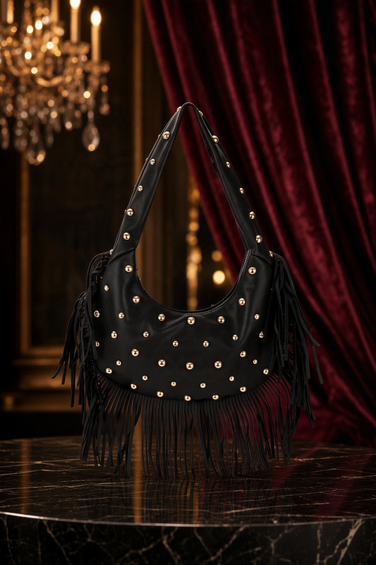 Bolso tote negro vestismuse de estilo punk con tachuelas doradas, flecos largos y cierre de cremallera en PU