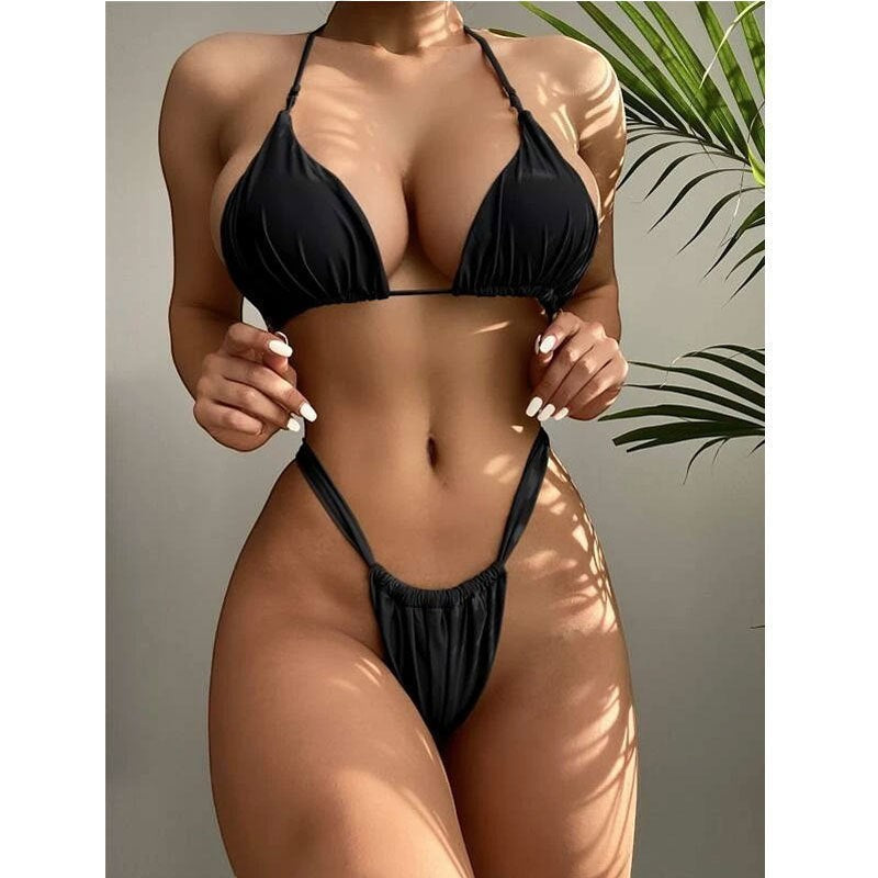Bikini negro de dos piezas vestismuse con top de triángulo y braguita de tiro alto que estiliza la figura