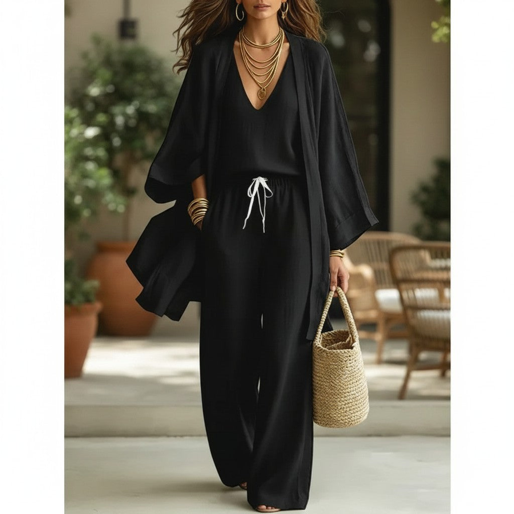 Conjunto negro de tres piezas vestismuse con cárdigan, top y pantalón de pernera ancha en poliéster fluido